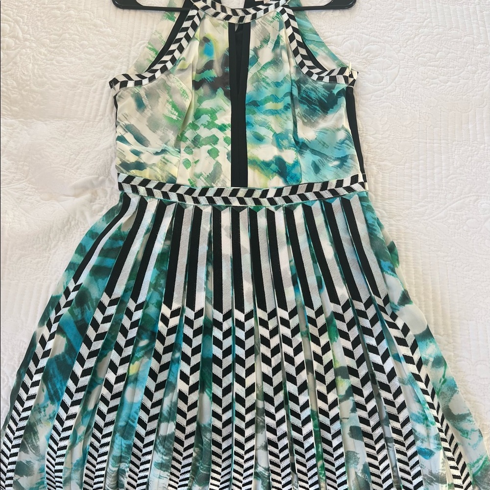 Parker dress medium but runs small waist across 14 inches top 16 inch length 33